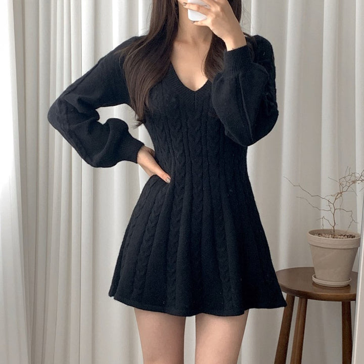 Robe en tricot pour femmes avec décolleté en V et design sans manches Chic & Stil
