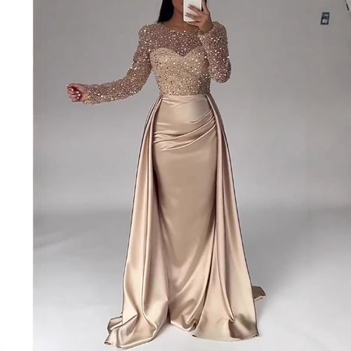 Women Elegant Evening Dress with Glitter Details and Flowing Fabric