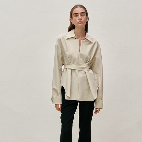 Trendy women's blouse with asymmetric cut and elegant waist Amarae