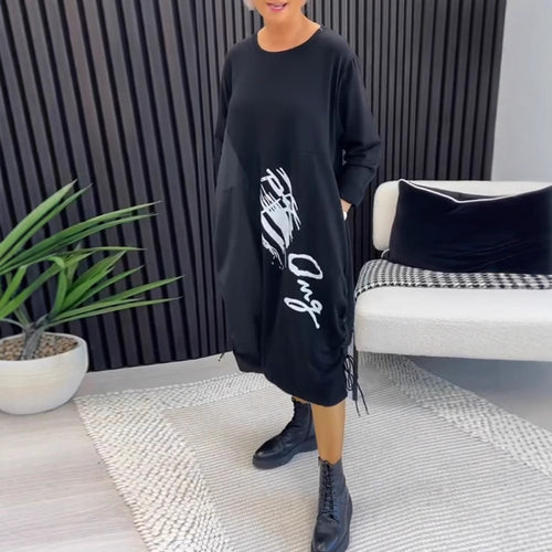 Robe hoodie oversize pour femmes avec poches latérales et imprimé graphique Chic & Stil
