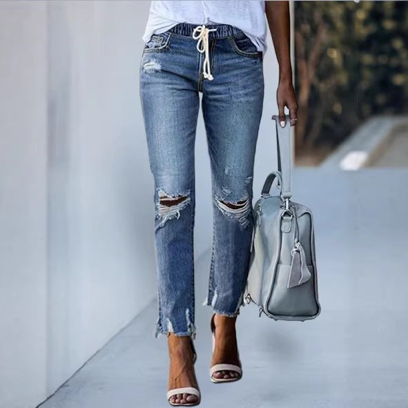 Women Cropped Denim Jeans with Drawstring Waistband, Destroyed Knee Areas and Raw Hem Amarae