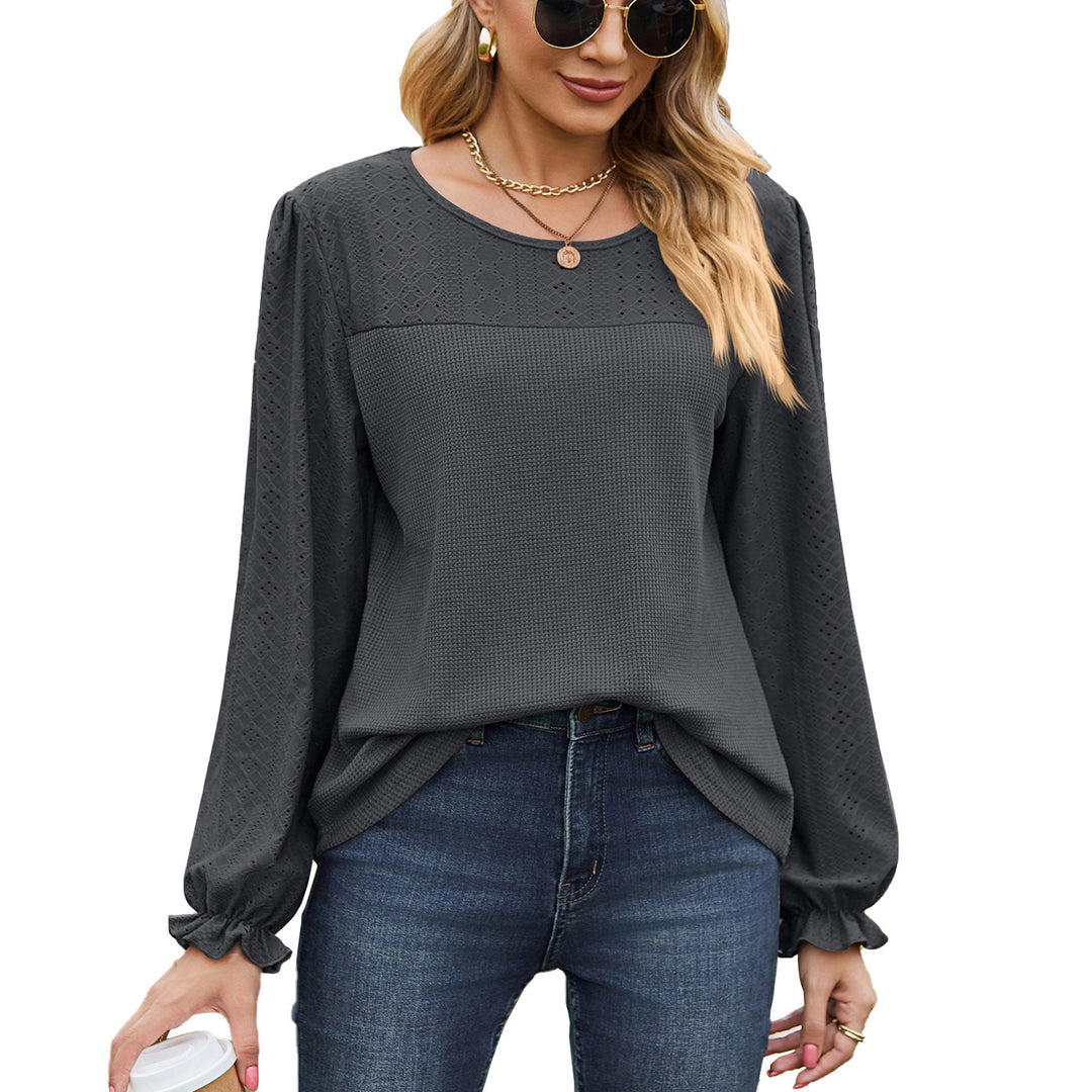 Women's top with textured design and elegant puff sleeves Amarae