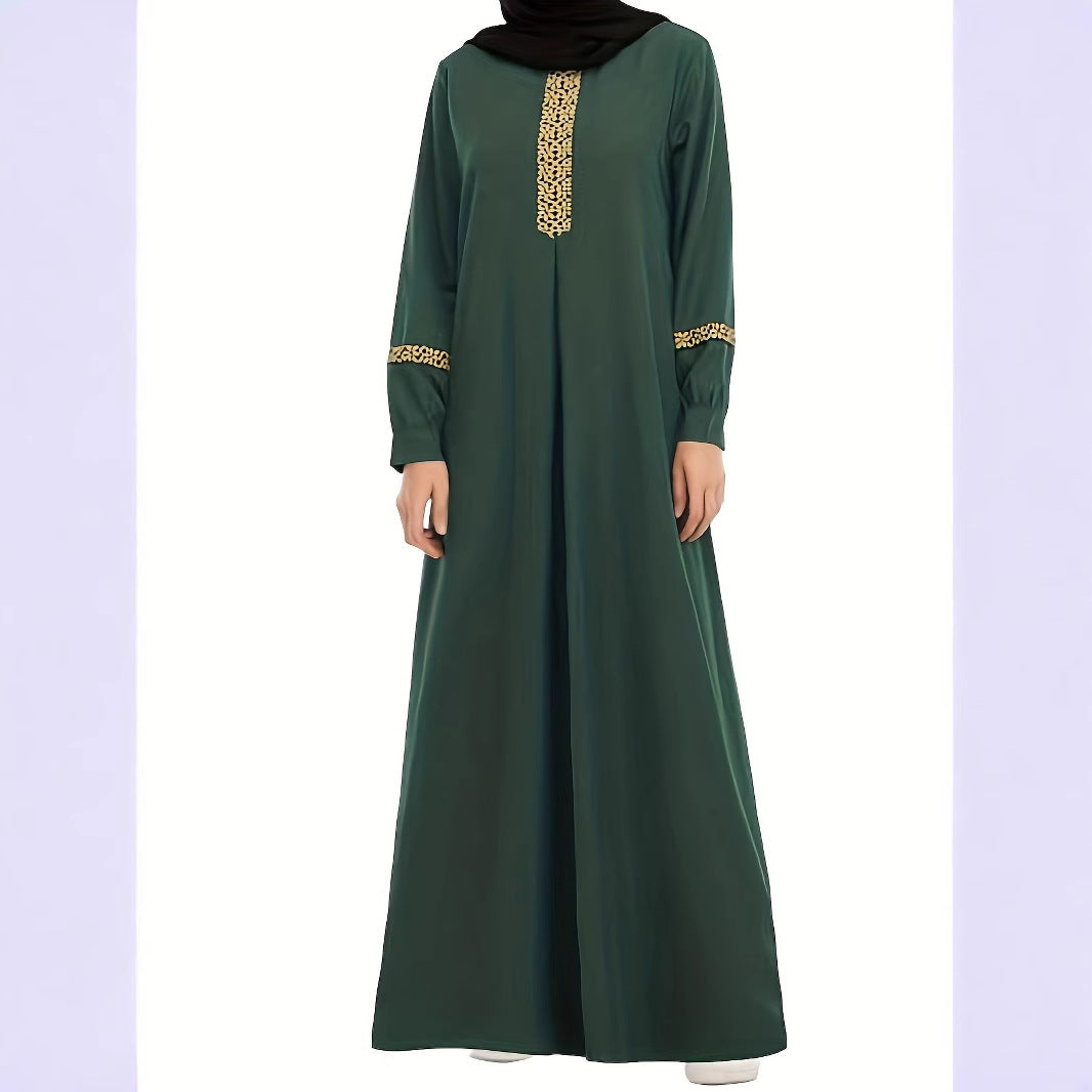 Kaftan dress for women with elegant golden accents and long sleeves Lune London