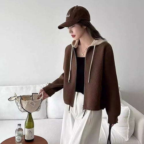 Veste matelassée à la mode pour femmes avec capuche et double zip Chic & Stil