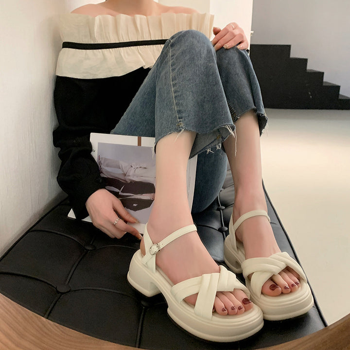 Women's sandals with stylish crossed straps and a comfortable block heel Lune London