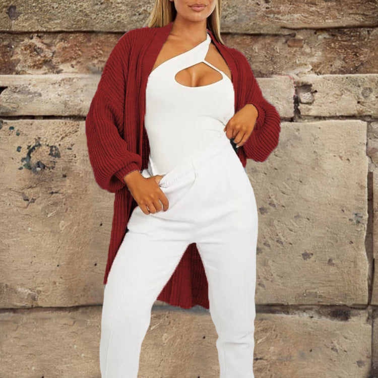 Thick knitted cardigan for women with a loose fit and practical pockets Lune London