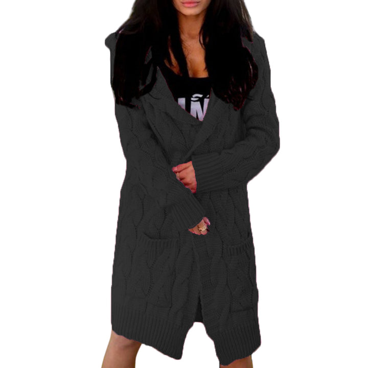 Knitted coat for women with bulky braid pattern and deep pockets Lune London