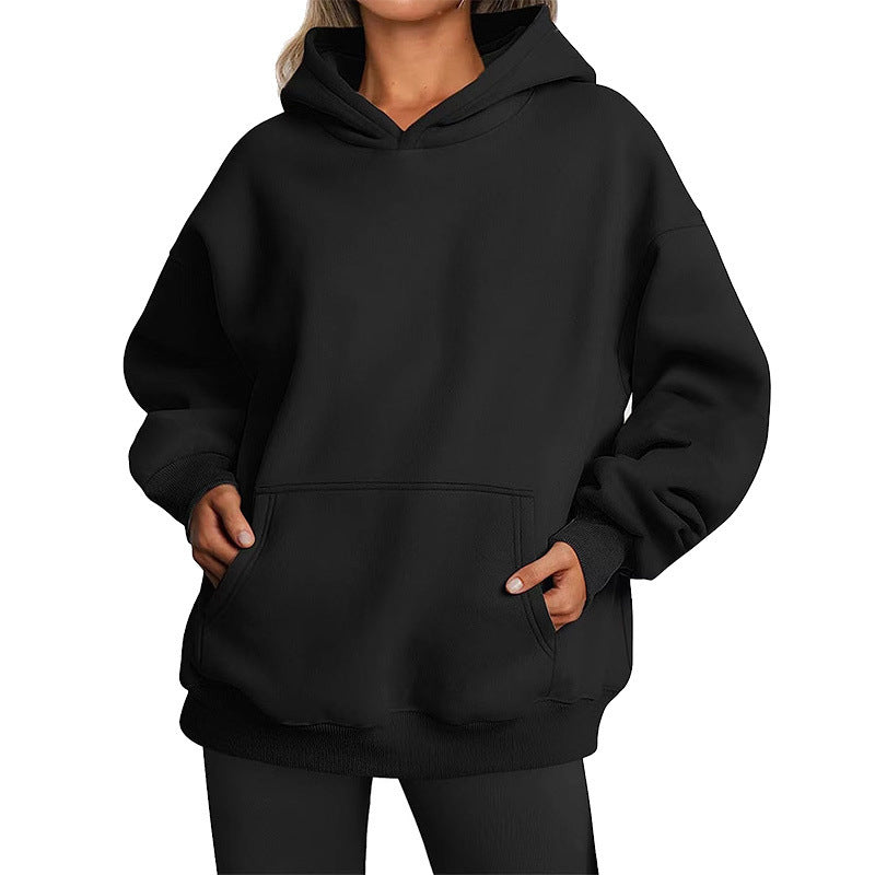 Women's oversized hoodie with practical kangaroo pockets and soft inner lining Chic & Stil