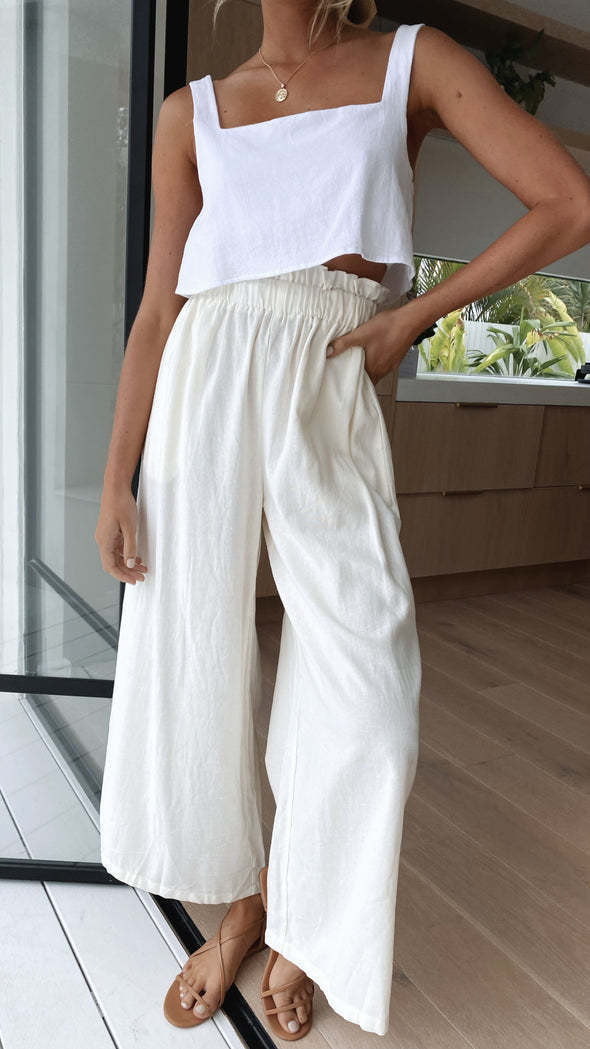 Loose linen pants for women with elastic waist and practical pockets Lune London
