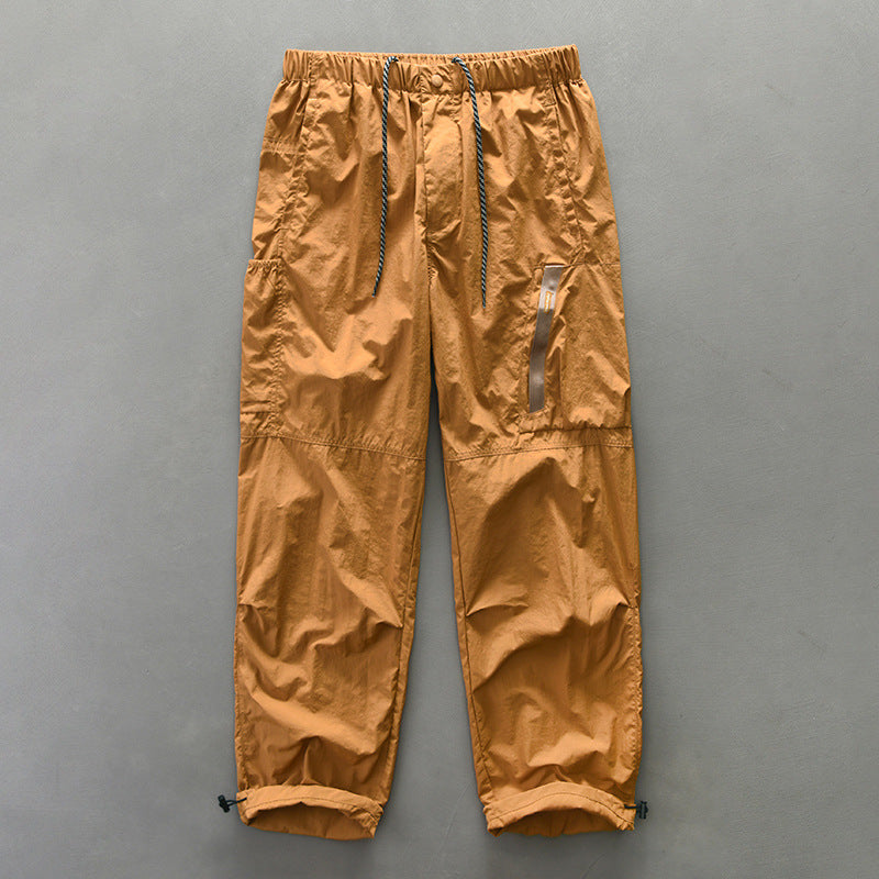 Functional pants for men with elastic waistband and zippered side pockets Lune London