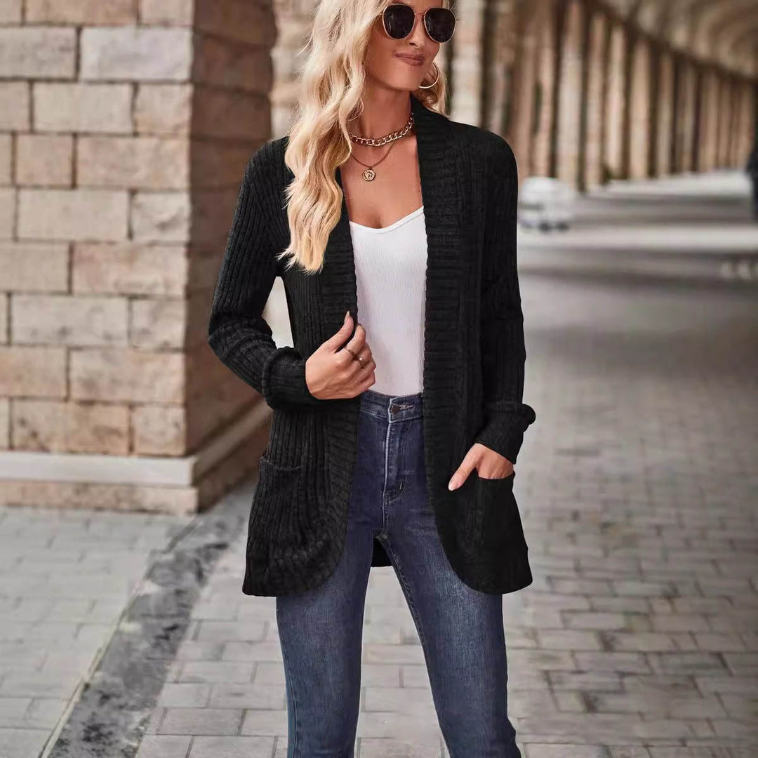 Knitted women's jacket with an open front closure and trendy ribbed structure Lune London
