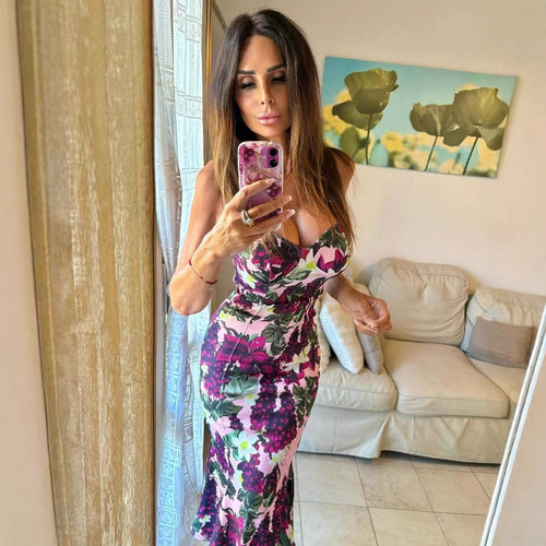 Maxi dress for women with a floral design featuring a fluid hem and a deep V neck Amarae