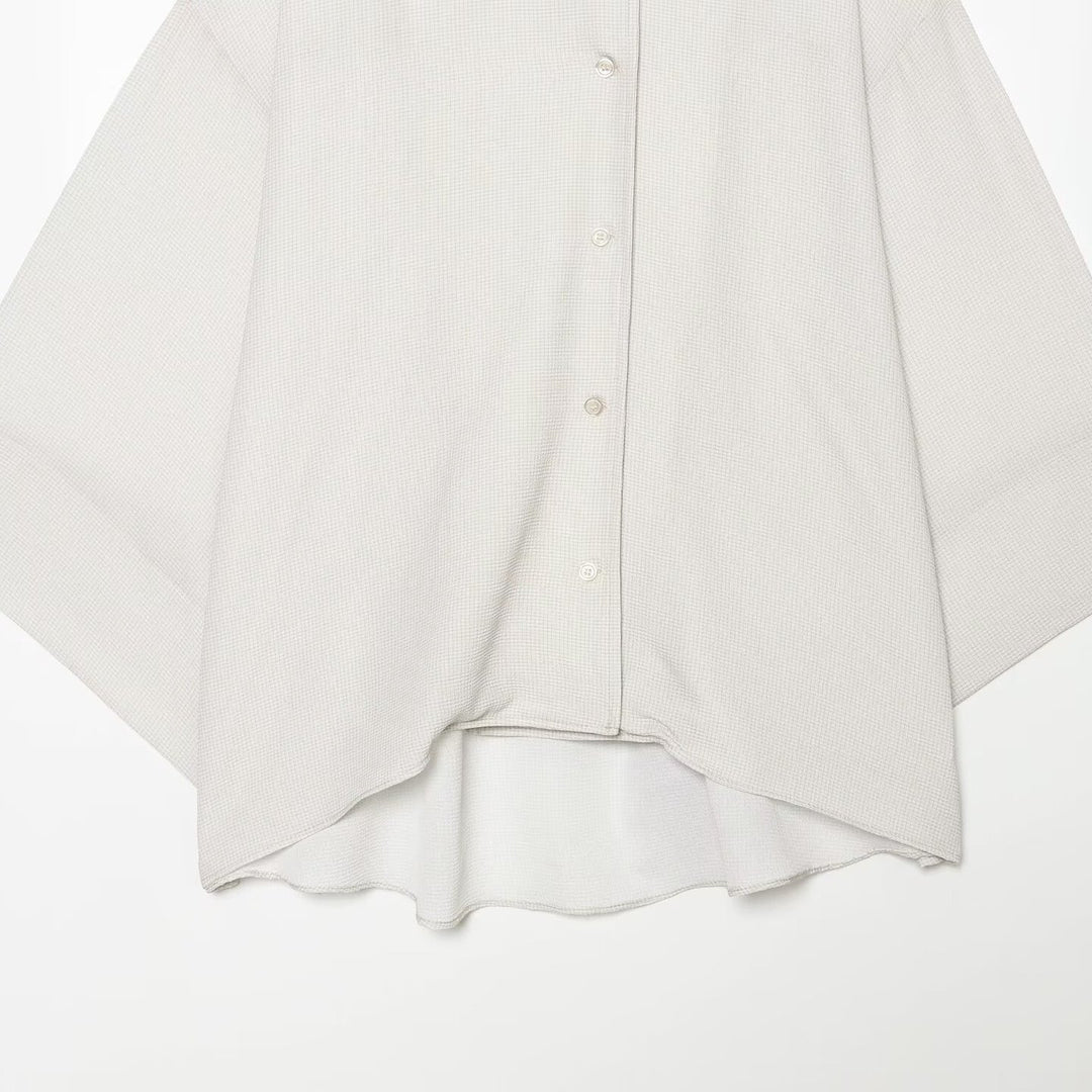 Women's oversized shirt blouse with waffle texture, boxy silhouette, and high-low hem