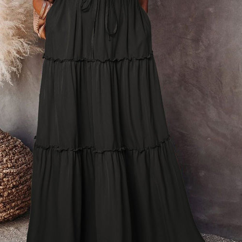 Long and flowing skirt for women with an elastic waistband and practical pockets Amarae