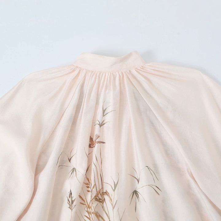 Women's blouse with stand-up collar, continuous button placket and wide balloon sleeves Amarae