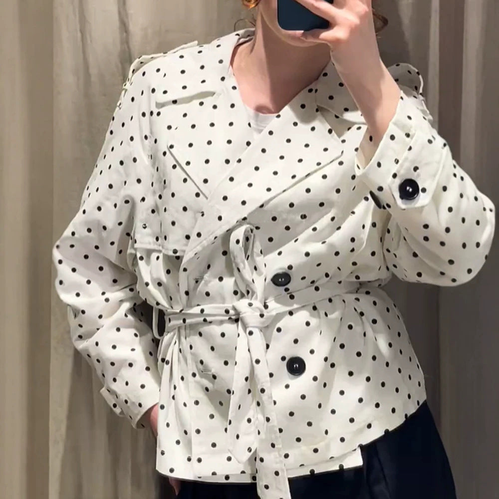 Women’s short trench coat with double breasted front, belt at the waist and polka dot print Amarae