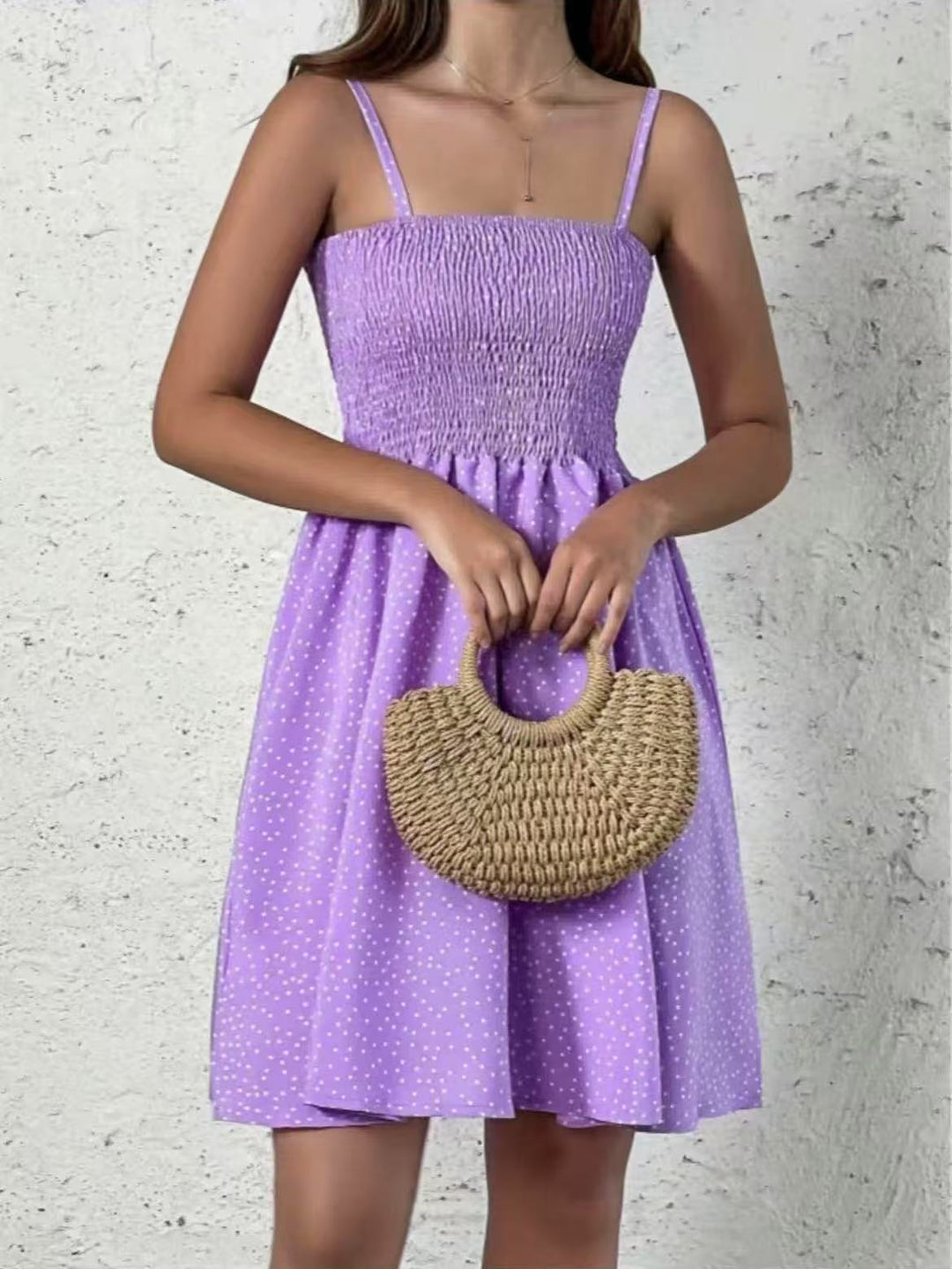 Halter neck dress for women with an airy silhouette and a lovely polka dot pattern Lune London
