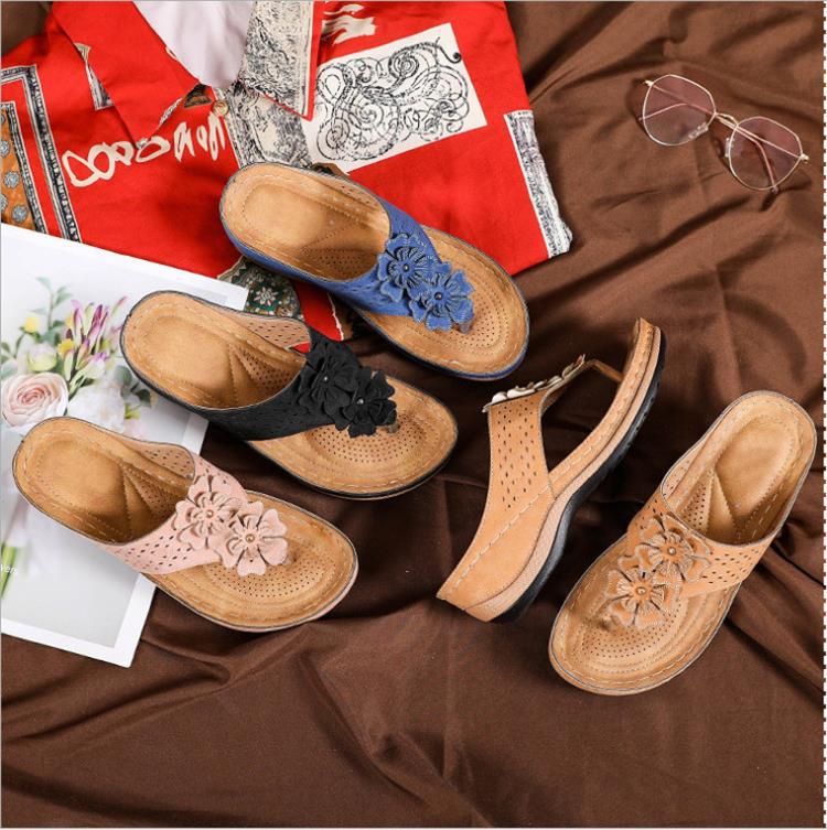 Comfortable thong sandals for women with decorative floral appliqués and an ergonomic sole Lune London