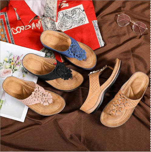 Comfortable thong sandals for women with decorative floral appliqués and an ergonomic sole Amarae