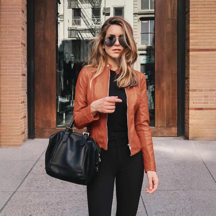 Ladies fitted faux leather biker jacket with stand-up collar and decorative seams Amarae