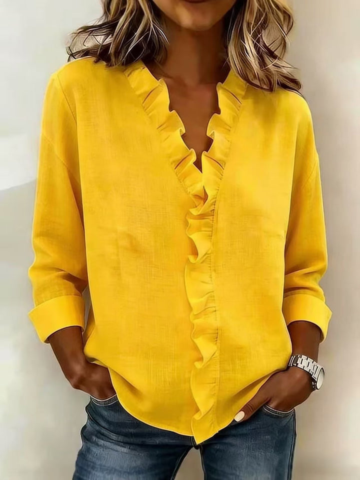 Women's romantic blouse with ruffle details and V-neck Lune London