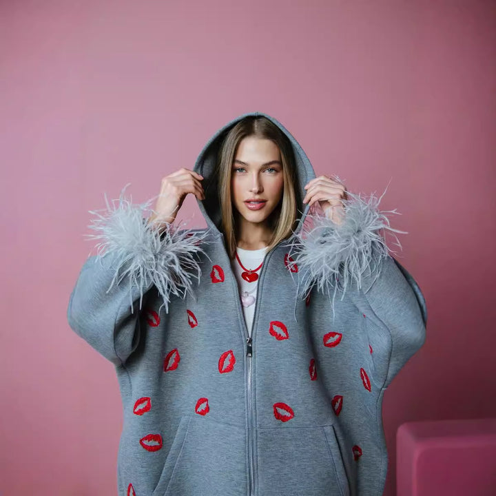 Hoodie for women with feathers and lips pattern Lune London