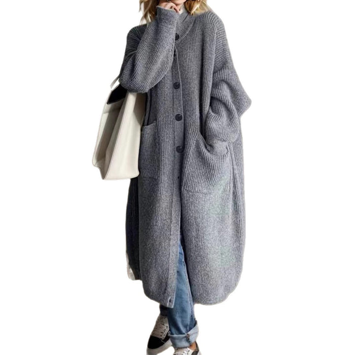 Trendy knitted jacket for women with generous pockets and chic button detail