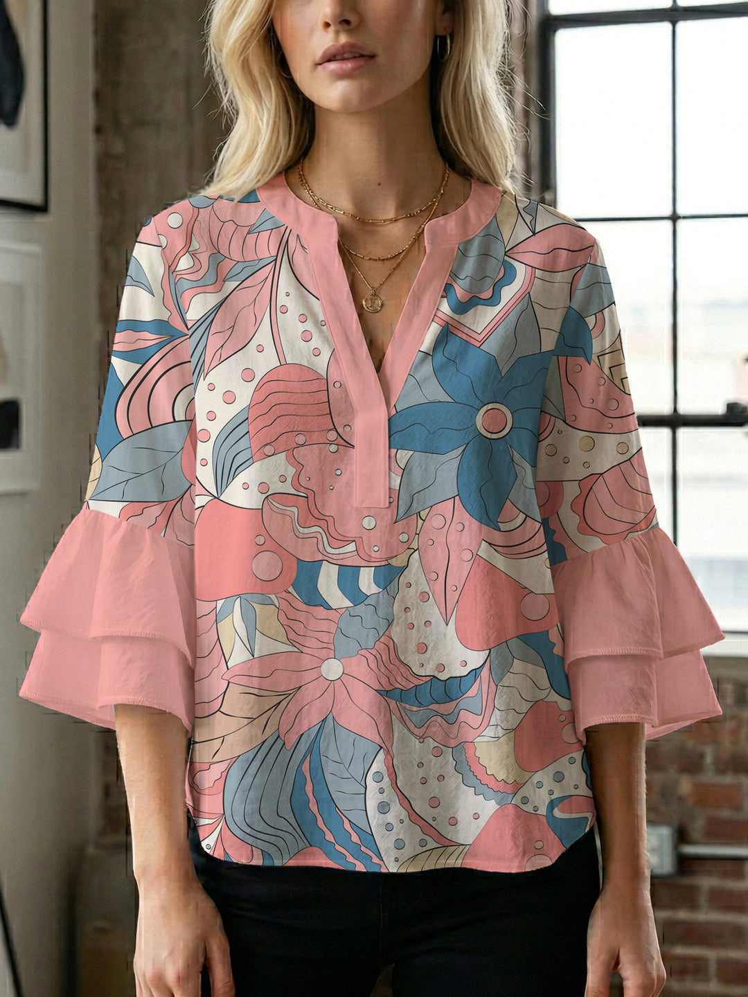 Ladies elegant top with voluminous ruffle hems and floral design Lune London