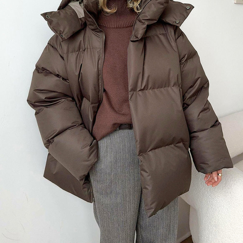 Women's winter coat with high collar and side pockets