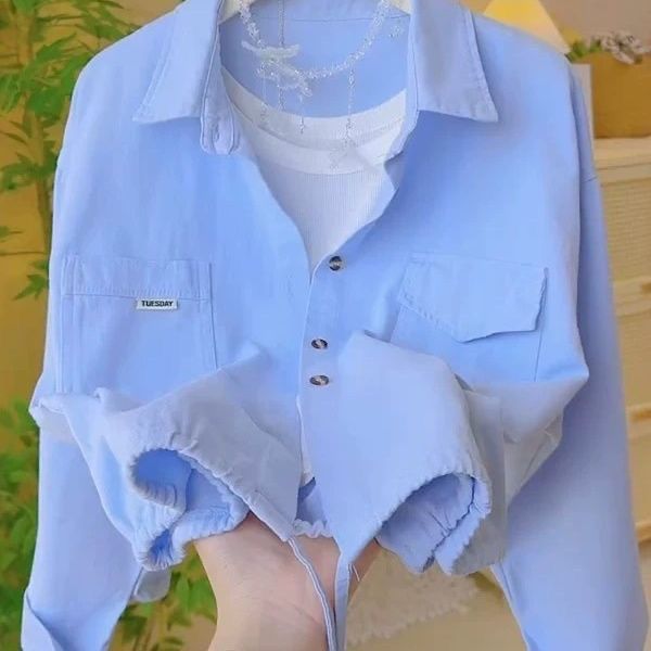 Blouse femme décontractée avec poches à rabat Chic & Stil