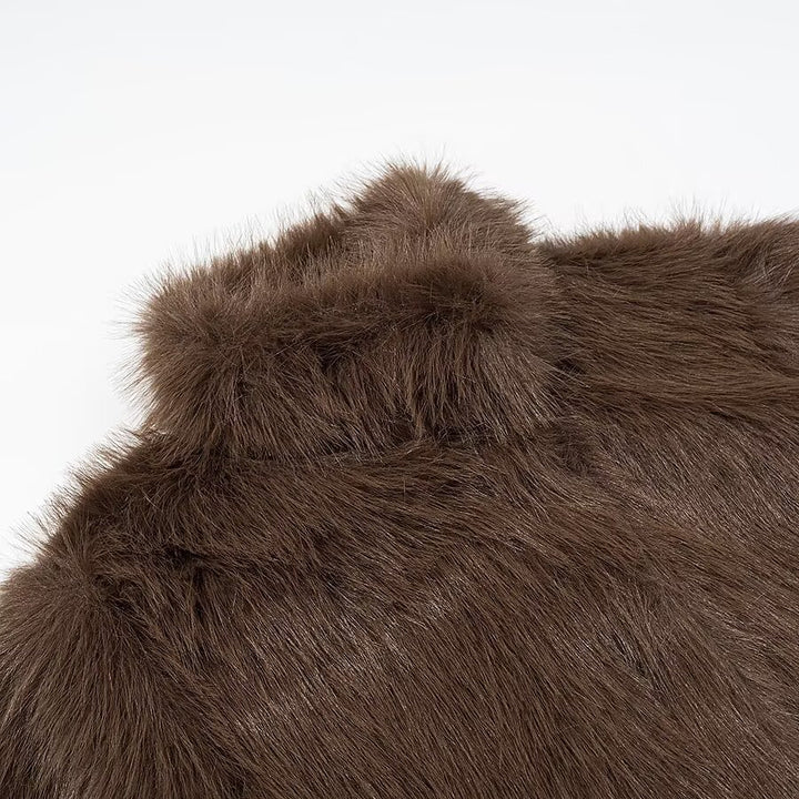 Veste en peluche confortable pour femmes avec col haut et coupe ample Chic & Stil