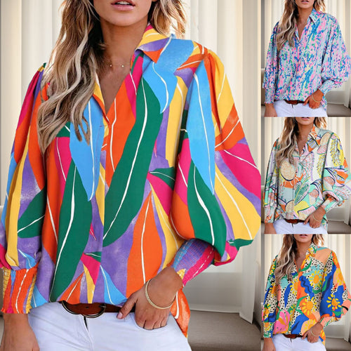 Shirt blouse for women with a vibrant floral design featuring off-shoulder and elastic cuffs Amarae