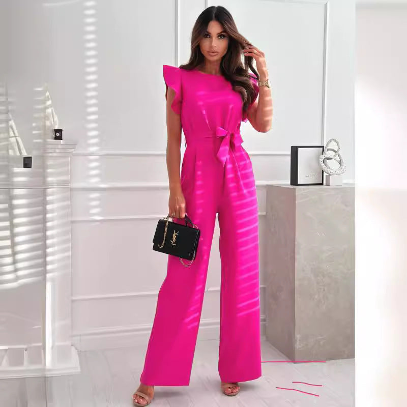 Elegant woman in flying sleeve jumpsuit Lune London