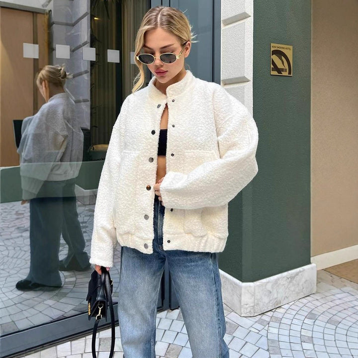 Women's teddy fleece bomber jacket in boxy cut with snap button closure and patch pockets Amarae