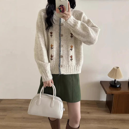 Ladies' knit jacket with floral design and high-quality button details Amarae