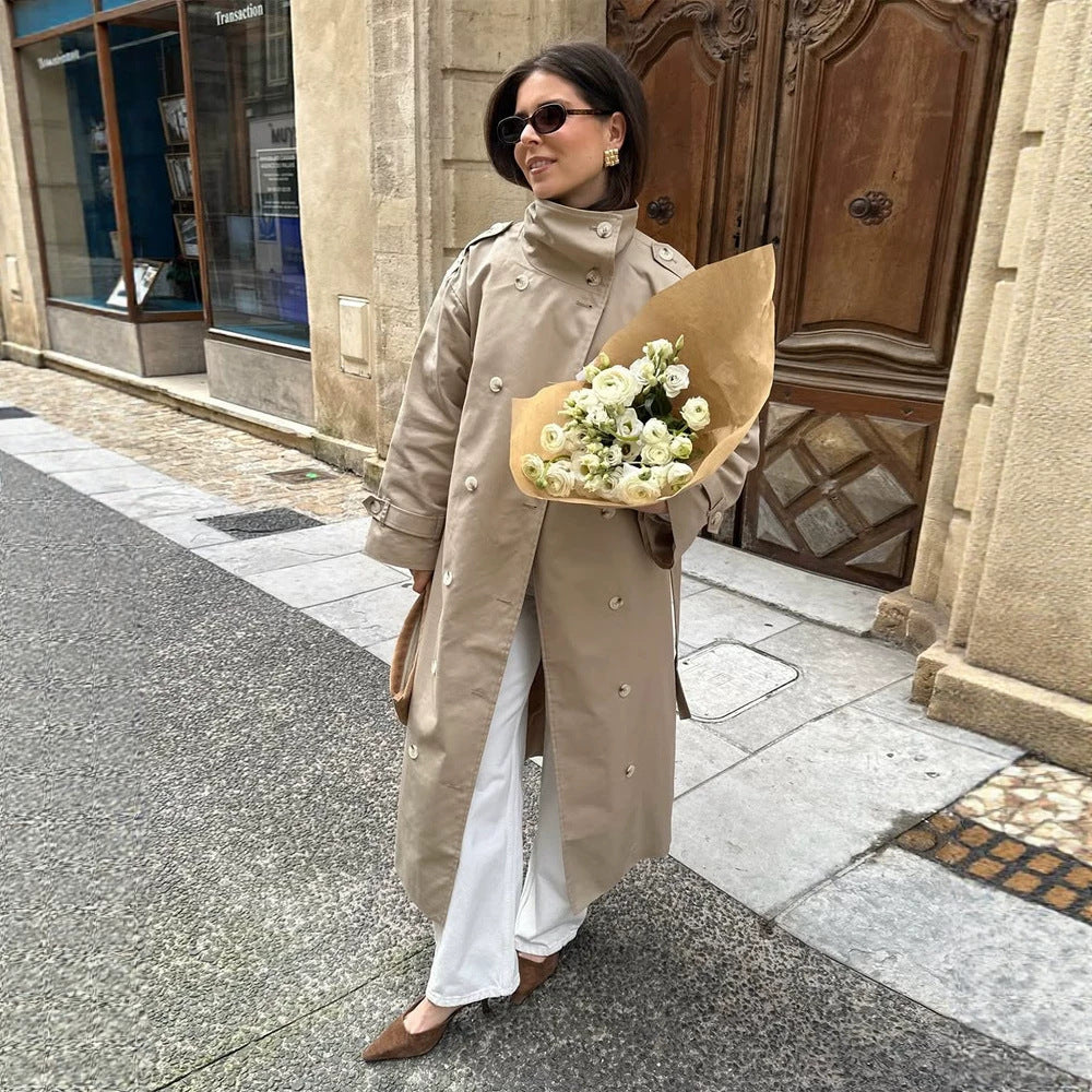 Women’s maxi trench coat with high stand-up collar, double-breasted button placket & waist belt Amarae