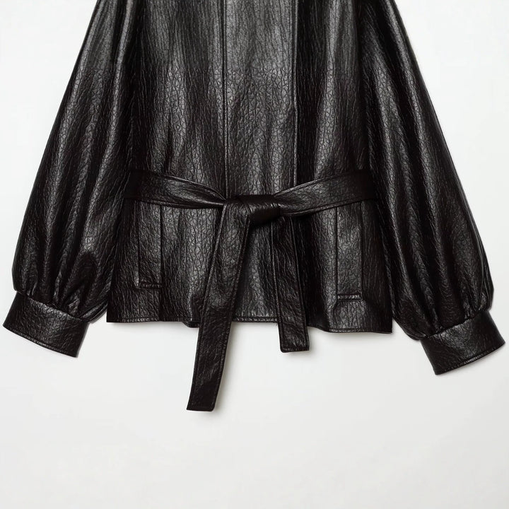 Women's short jacket made of faux leather with high buckle collar and waist belt Amarae