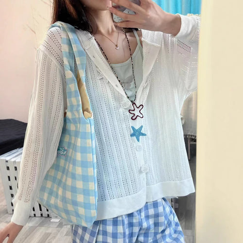 Knitted jacket for women with an airy lace pattern and practical pockets Amarae