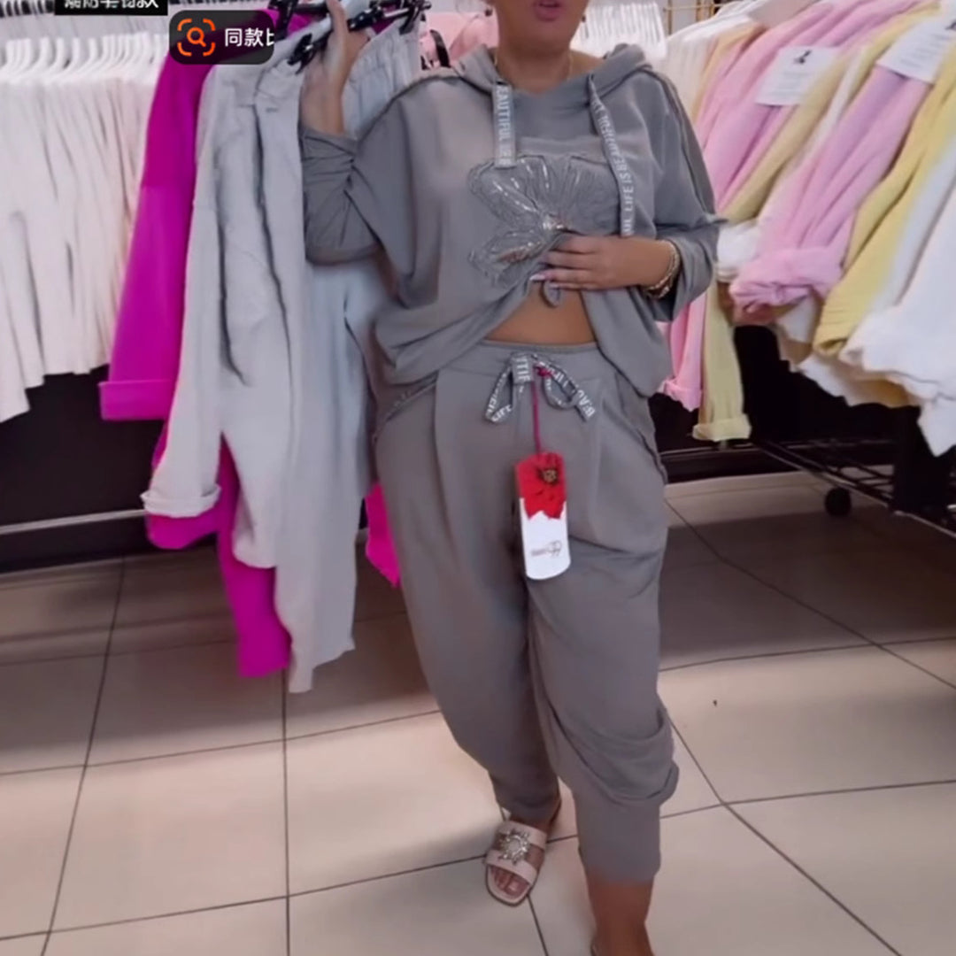 Haut de survêtement décontracté pour femmes avec un motif floral délicat et une broderie de haute qualité Chic & Stil