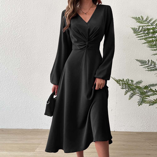 Elegant midi dress for women with a flattering drape and a deep V-neck Chic & Stil