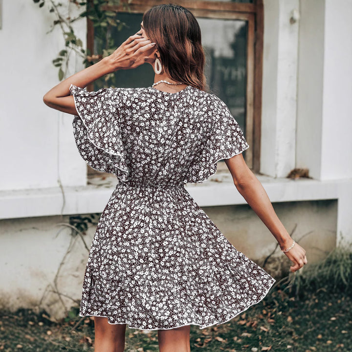 Ladies Twirl Dress with Flowing Floral Sleeves Lune London
