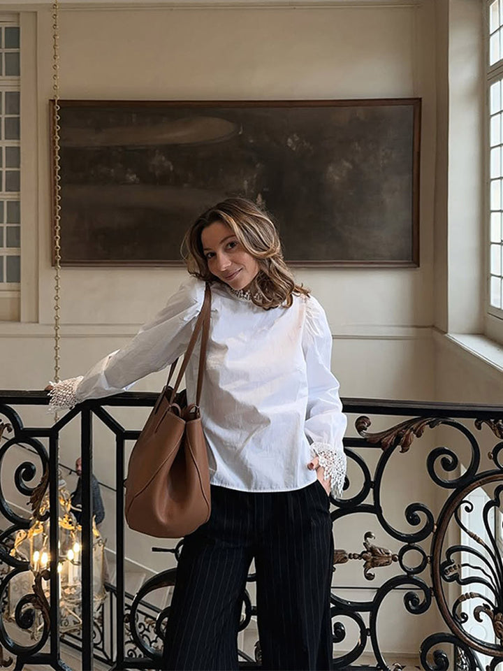 Blouse for women with elegant lace accents and puff sleeves Lune London