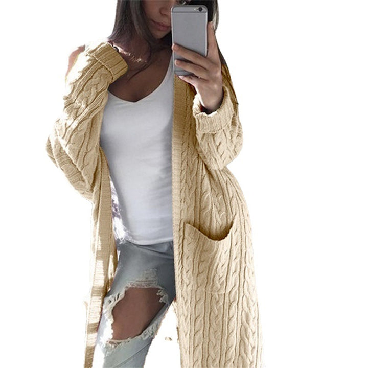 Women's knitted coat with patterns and practical pockets in an open cut Amarae