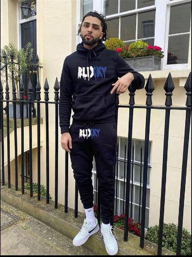 Women's hoodie and jogger pants set in a chic streetwear urban style