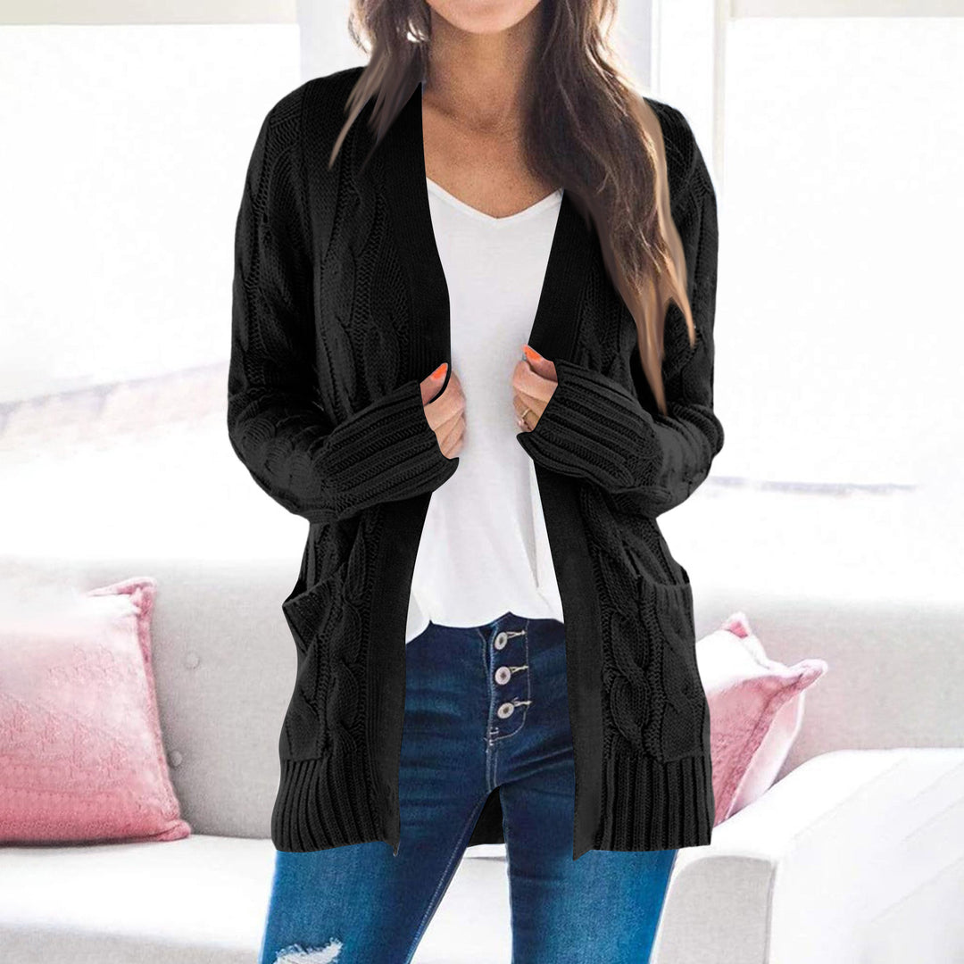 Thick knit jacket for women with modern cable patterns and practical pockets Lune London