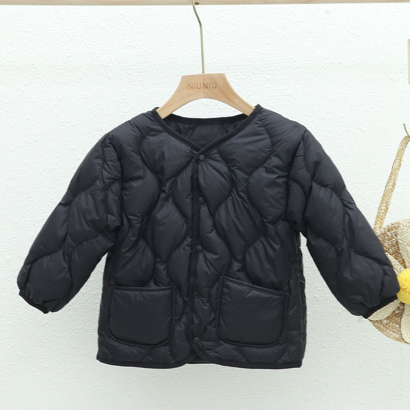 Ladies short quilted transitional jacket with round neck, press stud closure and patch pockets Amarae