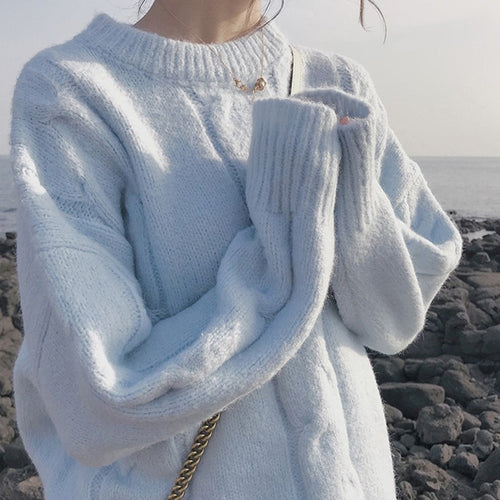 Pull femme en maille épaisse avec texture côtelée et détails décoratifs Chic & Stil