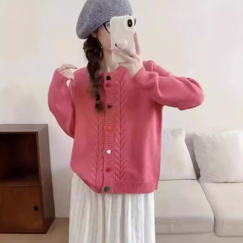 Women's cozy cardigan with button embellished details and a playful design Amarae