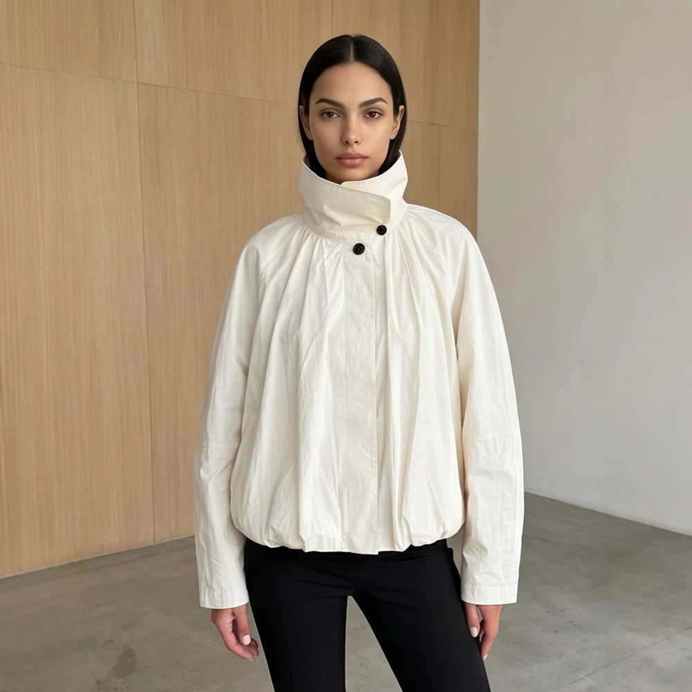 Women's short jacket with high stand-up collar, gathered shoulder area, and elastic hem Amarae