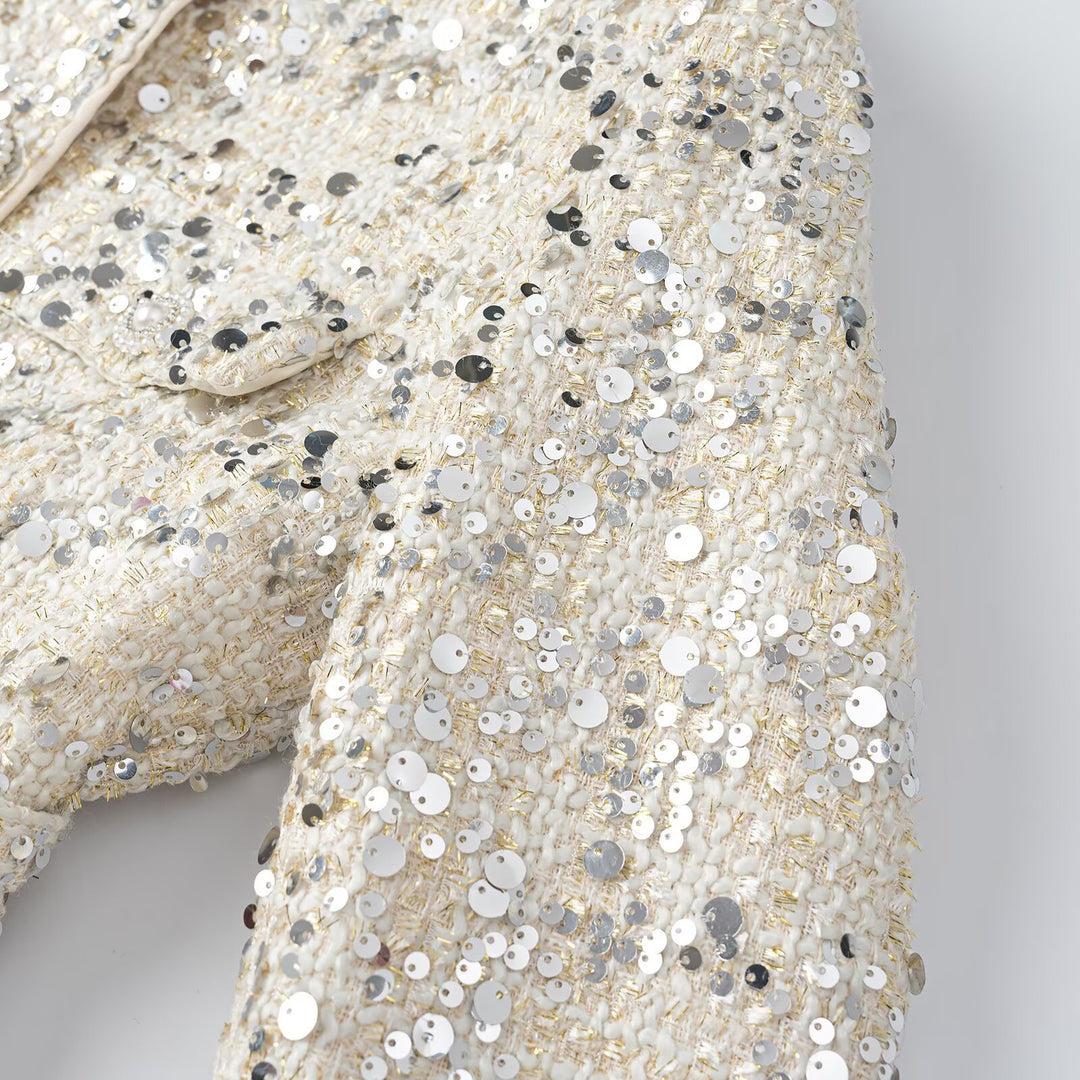 Women's short jacket made of bouclé with sequin trim, decorative pearl buttons, and a belted waist Amarae